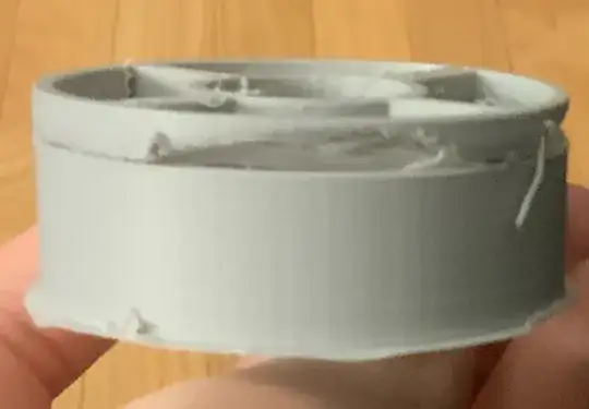 Photo of a printed model where the top portion has begun to show stringing