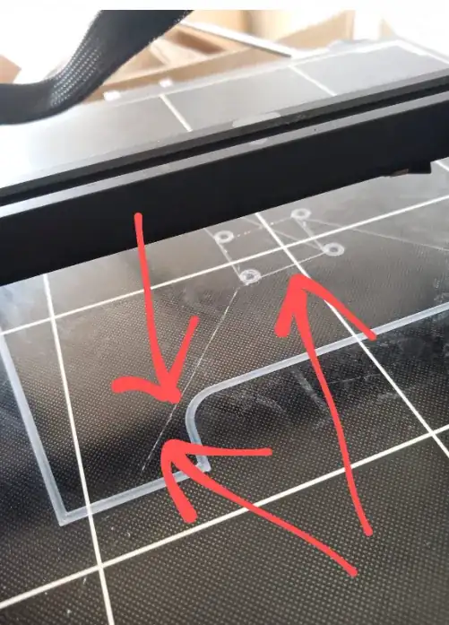 Photo of print bed with faint filament lines that don't look like part of the printed model 