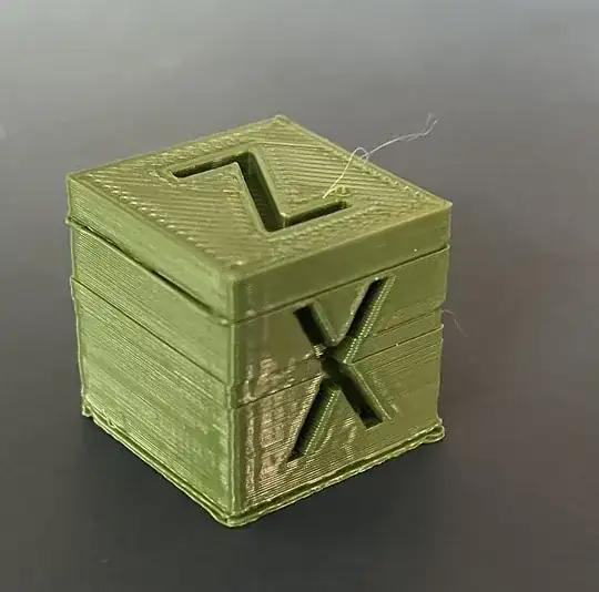3D printed calibration cube with printing errors