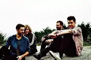 Bastille in 2013: Kyle Simmons, Chris Wood, Will Farquarson, and Dan Smith (left to right)