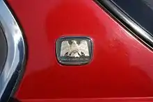  Raptor emblem with text reading "Honda of America Mfg. Inc." below.