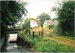 A gated village Barrow Crossing/foot crossing in Caersws in 2010.