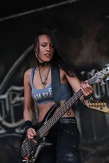 Majura performing as part of Equilibrium in 2014