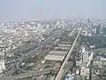 A view east from the observation platform of Bangkok's Bayoke tower showing Airport Rail link