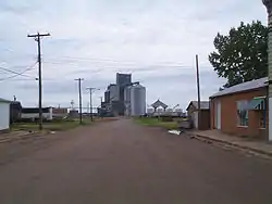 View of the main road looking towards a grain elevator