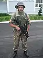 Montenegrin soldier holding a HK MP5