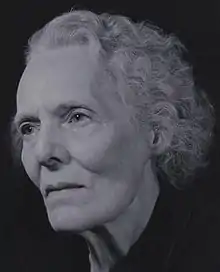 A photograph of H.D. in 3/4 portrait