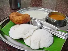 Image 87Idli served with typical accompaniments. (from Malaysian cuisine)