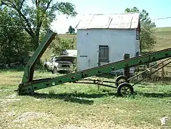 Grain conveyor on a farm near Belle