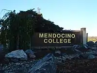 Name sign at campus entrance