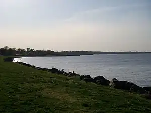 The Raritan Bayshore at Laurence Harbor in Old Bridge, New Jersey, looking westward along the Raritan Bay towards the adjacent  Middlesex County city of South Amboy