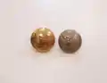 ROC metal tunic buttons, (Gilt Officer's button 3 mm larger in diameter), depicting the Elizabethan coast watcher emblem.