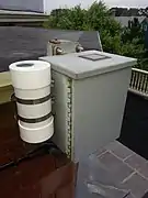 Closeup of the weatherproof box housing a whole sky camera.